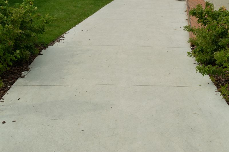 Enhance Safety and Smoothness With Professional Sidewalk Resurfacing!